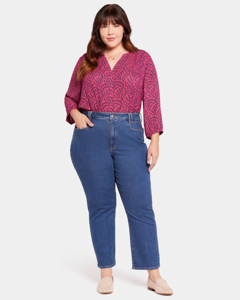 Front of a model wearing a size 14W Kristi Relaxed Straight Ankle Pants in Waterfall by NYDJ. | dia_product_style_image_id:296179